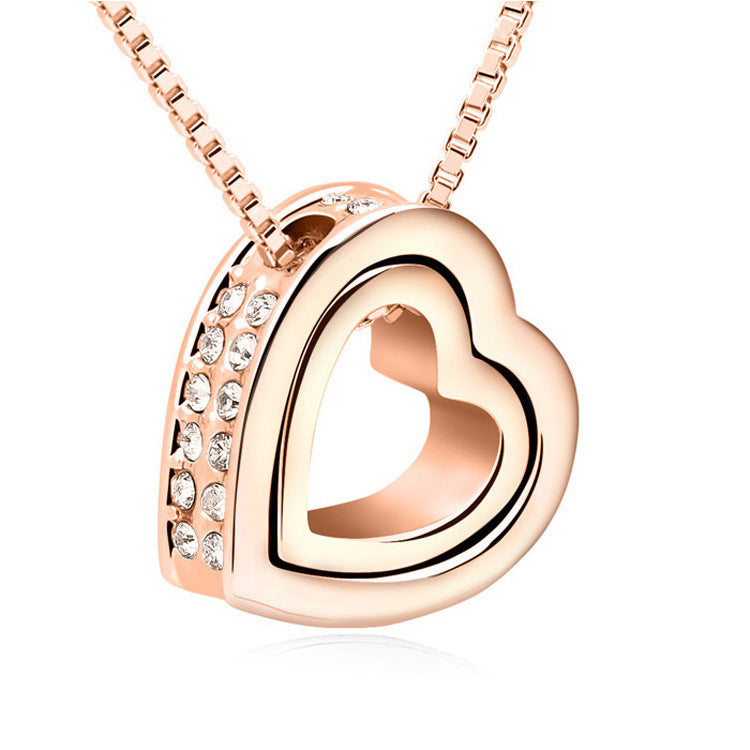 Crystal-Studded Hollow Heart Pendant Necklace - Aeva Luxe