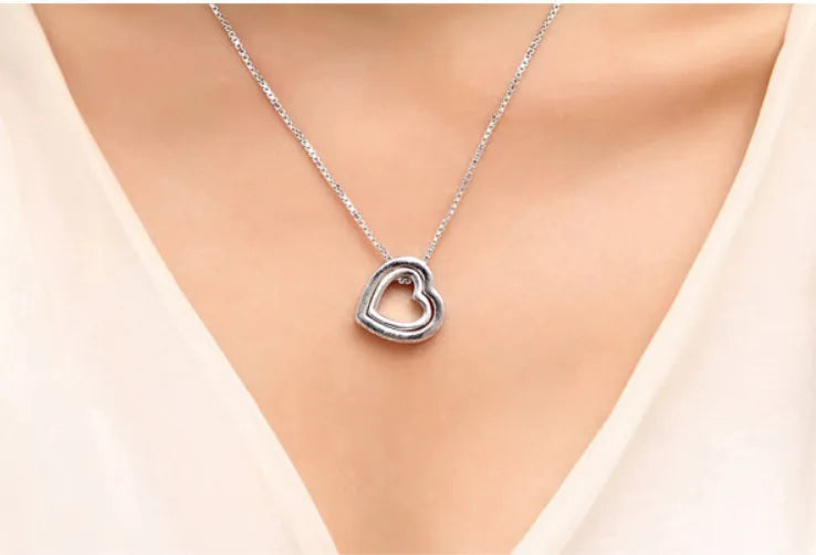 Crystal-Studded Hollow Heart Pendant Necklace - Aeva Luxe